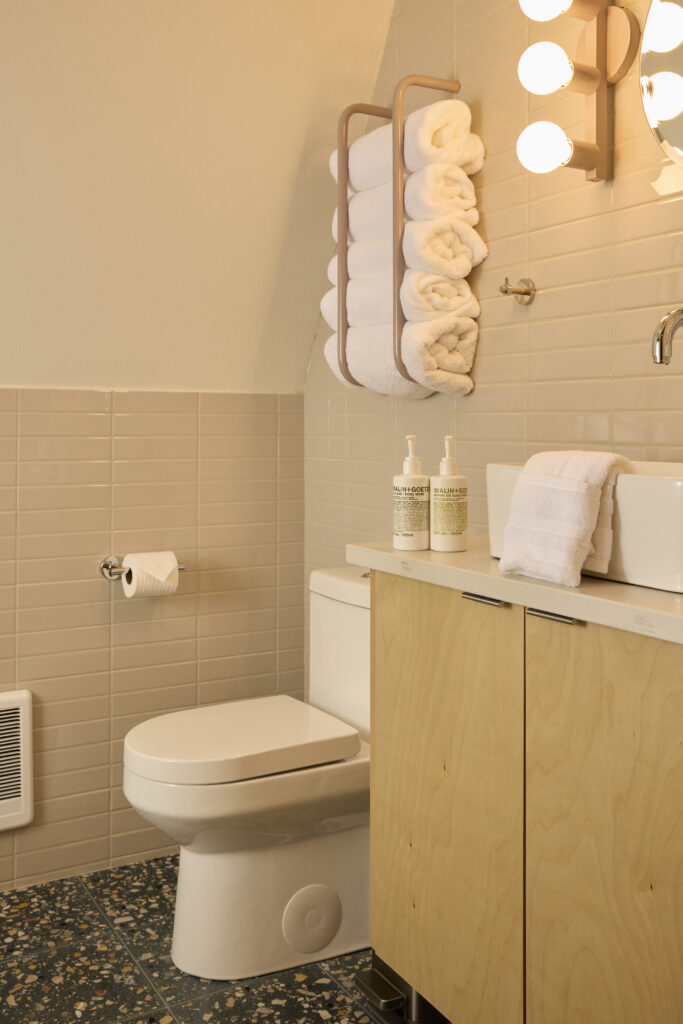 Bathroom with terrazzo tile floors and a walk-in shower