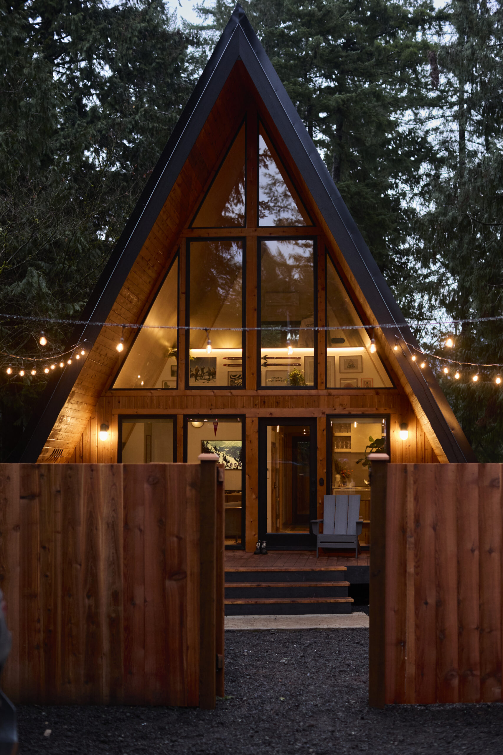 All five Camp Cabins set among the trees for a group gathering